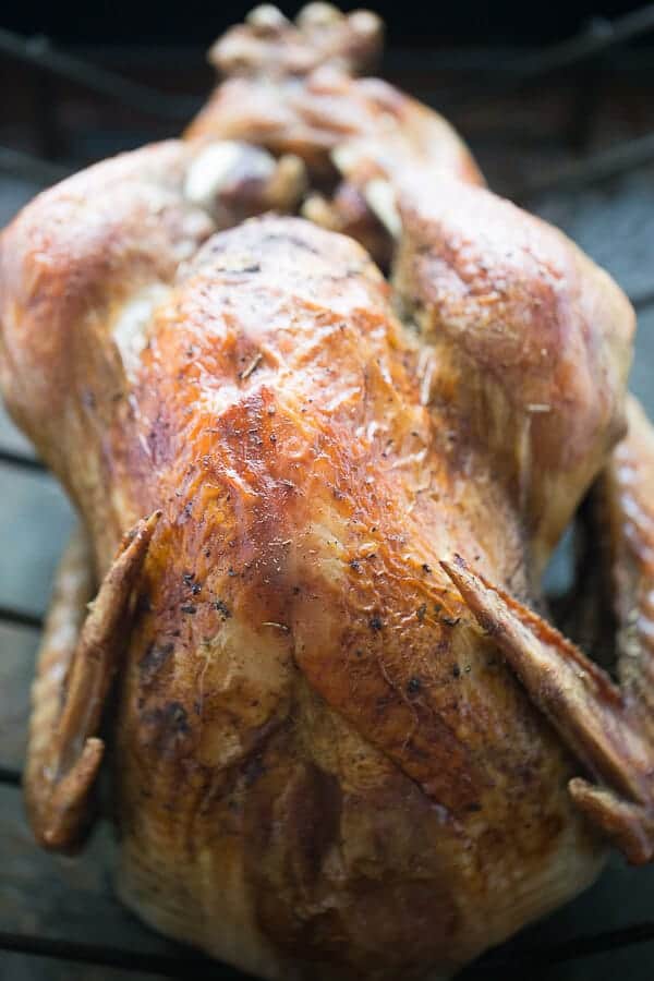 Slow roast turkey recipe that delivers flavorful and moist turkey every time! lemonsforlulu.com