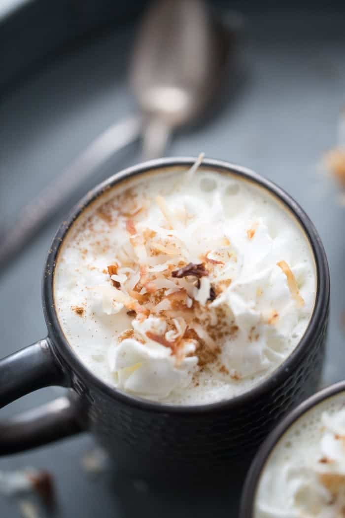 You can’t believe how easy it is to make your own white hot chocolate! This recipe is topped with toasted coconut! lemonsforlulu.com