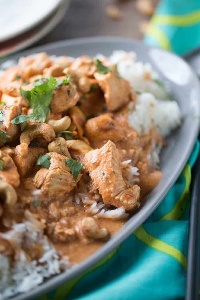 A simple chicken curry recipe made with cashews, cashew milk, and a hadnful of spices! You won’t believe how easy and delicious this recipe is! lemonsforlulu.com