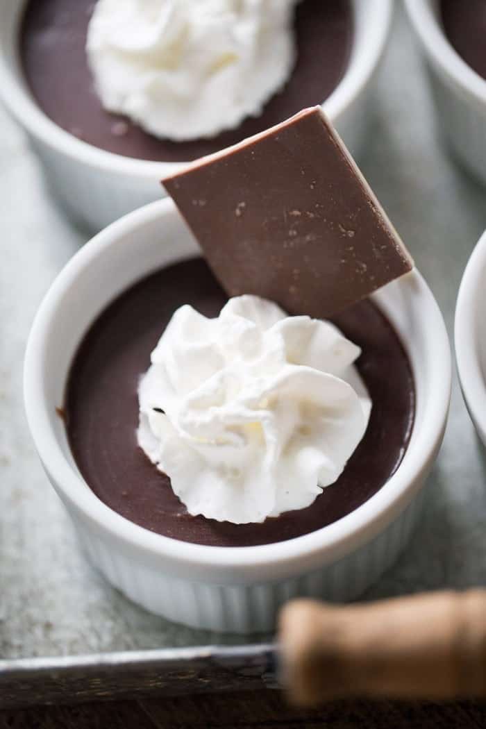 Both white and dark chocolate are in this pots de creme recipe, both are infused with peppermint for a festive holiday twist! lemonsforlulu.com