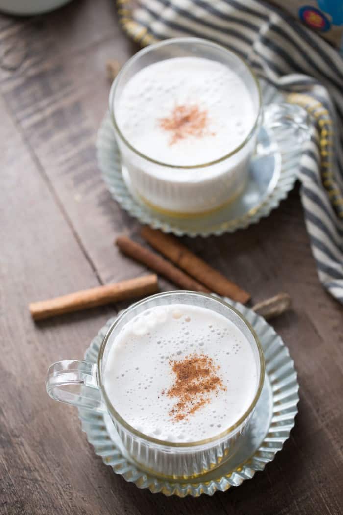 Soothe and comfort yourself with a warm glass of almond milk! Almond milk is infused with cinnamon , frothed and poured over honey! A simple and slightly sweet beverage that is so delicious! lemonsforlulu.com
