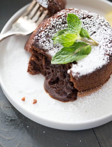 Limoncello chocolate lava cake is a rich and fudgy dessert, perfectly baked into individual portion sizes! You'll love these Limoncello infused chocolate lava cakes!