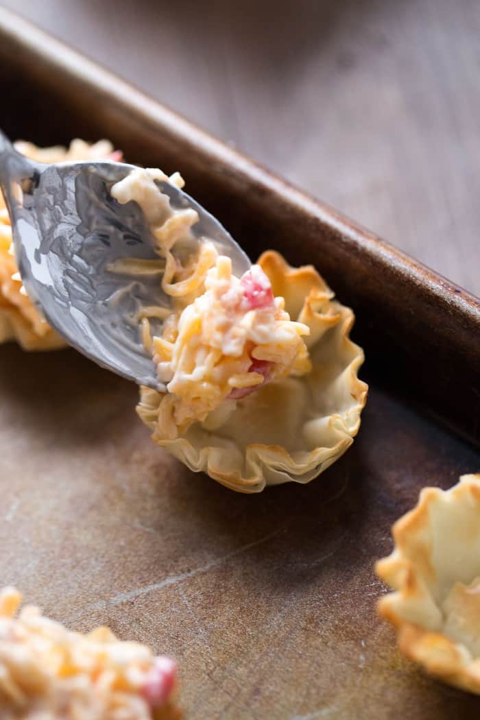 Flaky little fillo cups filled with a pimento cheese spread then baked; an appetizer for any occasion!