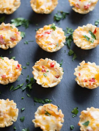 Homemade pimento cheese tucked inside little fillo cups! Perfect little finger foods!