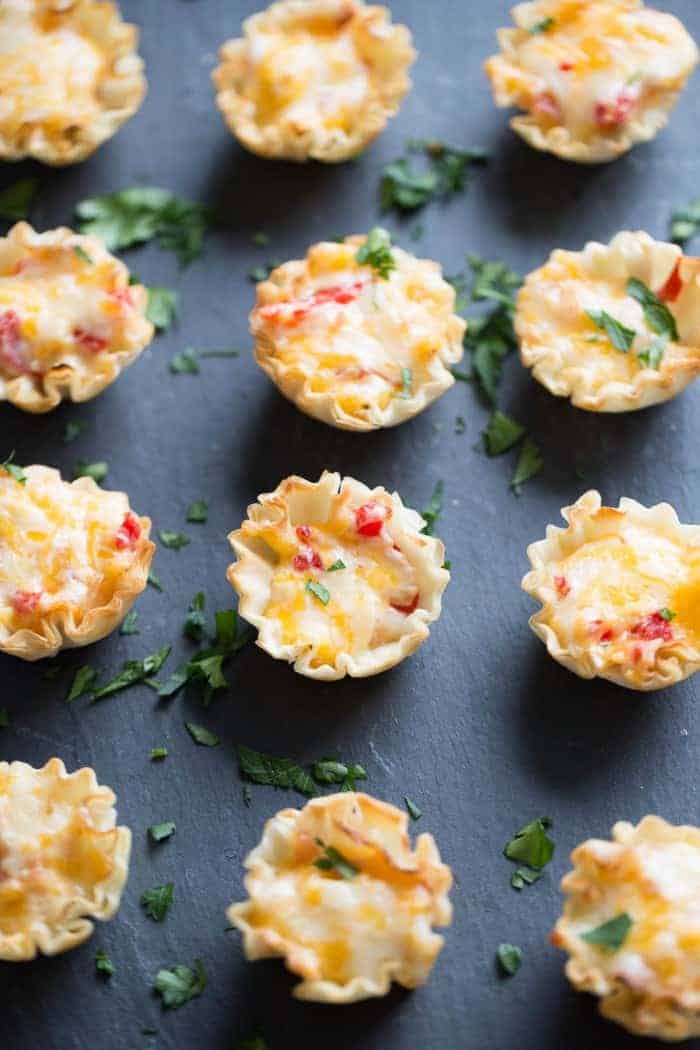 Homemade pimento cheese tucked inside little fillo cups! Perfect little finger foods!