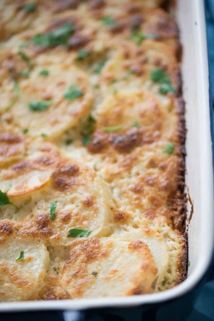 Easy scalloped potatoes with cheese will be everyone's favorite side dish!