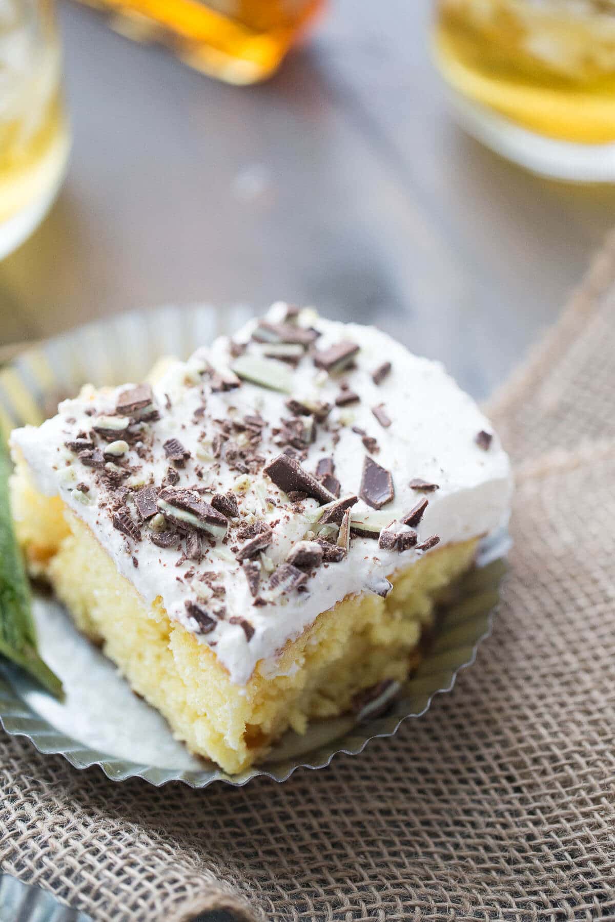 Whether mint julep cocktails are your thing or not, I promise you will love this decadent poke cake dessert recipe!