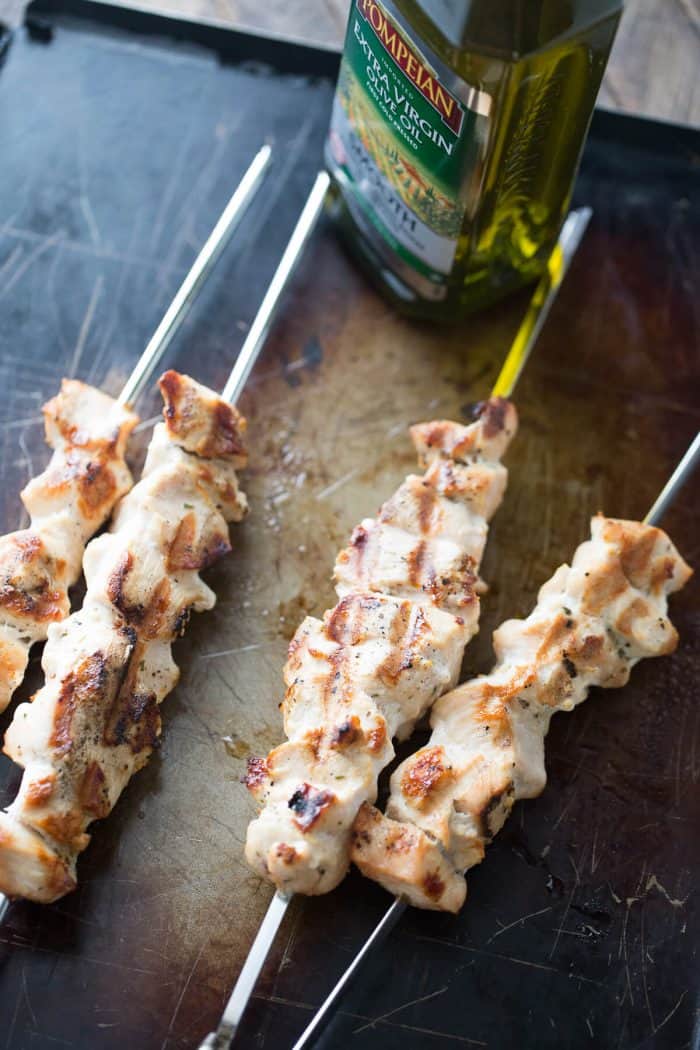 Chicken Souvlaki is a Greek staple! This easy grilled chicken is added to pasta, crisp and fresh vegetables and then topped with a homemade dressing.