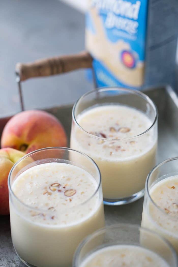 Peach Lassi recipe made with lots of fresh peaches and Greek yogurt. Easy and healthy never tasted so good!