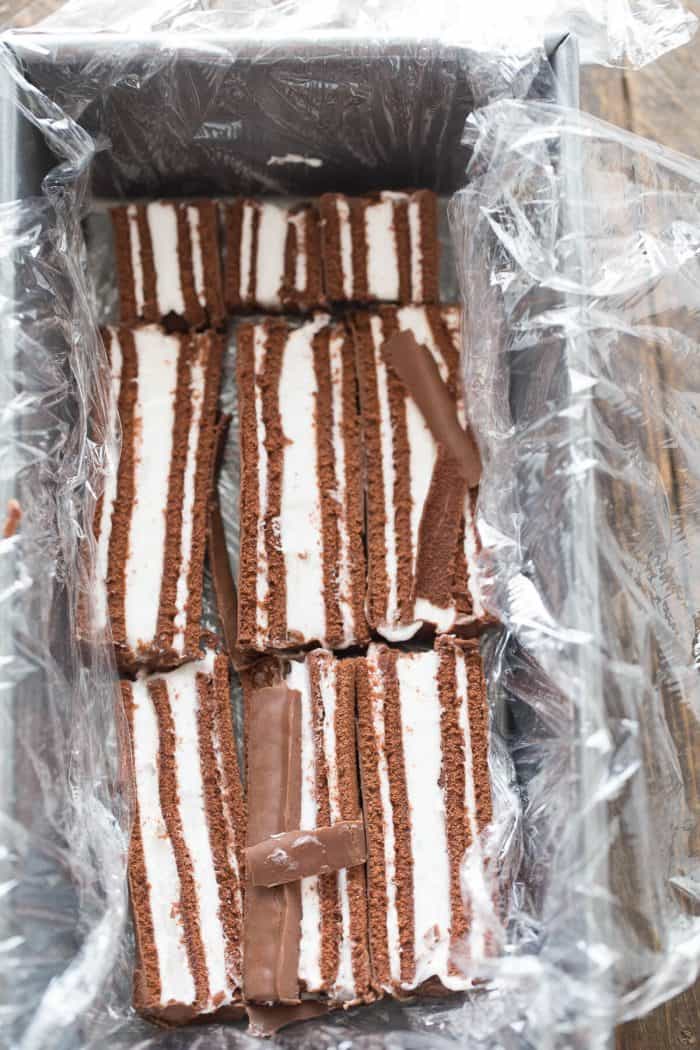 A Swiss Roll ice cream cake with so many lovely layers! Swiss Roll cakes are separated by layers of strawberry ice cream, vanilla ice cream and chocolate ice cream!