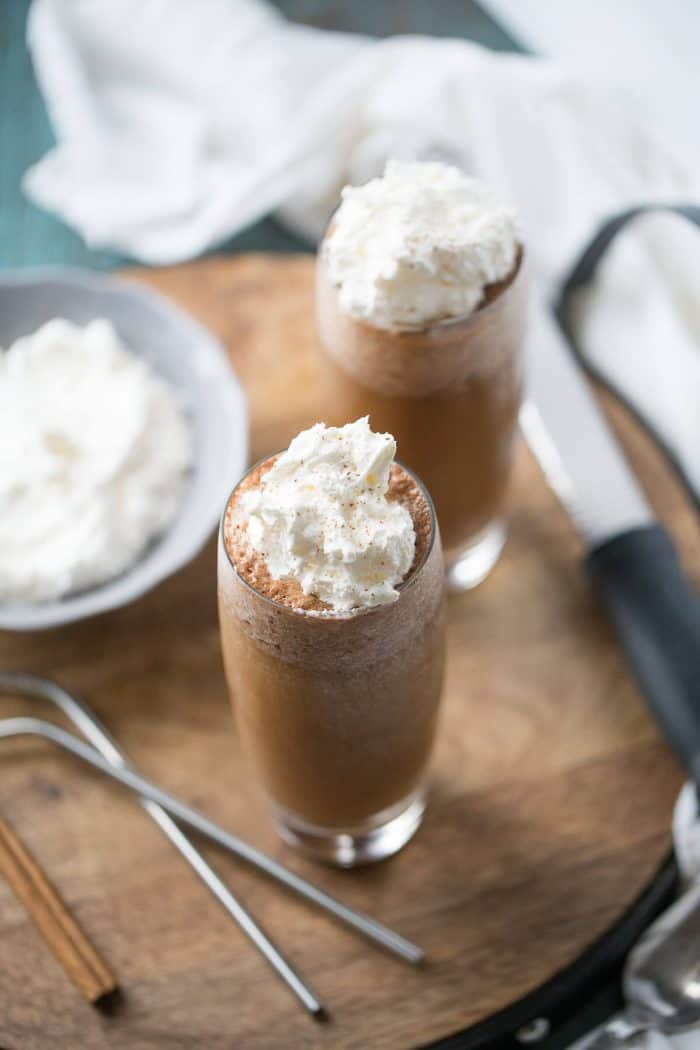 Thai Iced Coffee will you blow you away! This cook, frothy drink features seasoned coffee sweetened with almond milk and whipped cream! It is the perfect pick me up!