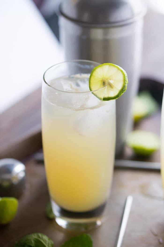 A vodka Collins with a key lime garnish
