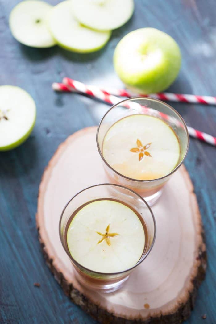 Caramel apple cocktail is the adult version of the classic fall treat! Crisp rum, apple and caramel liqueurs make this the perfect beverage for fall!