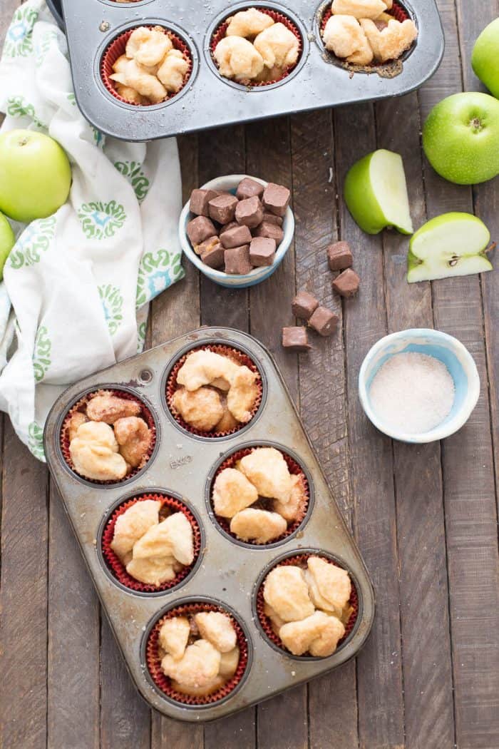 Love monkey bread? These little muffins are even better! Caramel and apples are tucked inside each one!