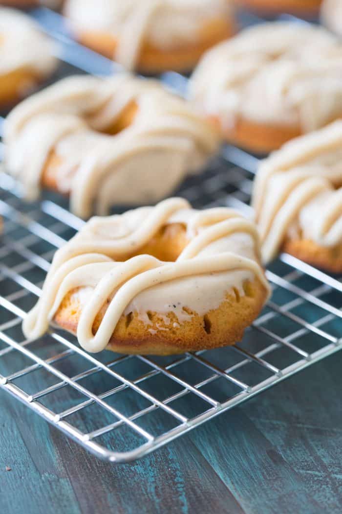 These baked sweet potato donuts explode with fall flavors! They are sweet with a hint of spice!