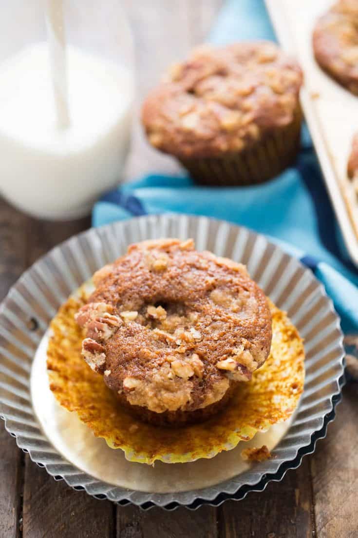 Soft gingerbread muffins with a rich cheesecake center and a streusel topping! Breakfast just got better!