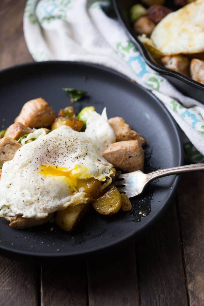 Veggies, bacon and leftover turkey make up this easy turkey hash. Top the dish with cooked eggs for a hearty breakfast for dinner!
