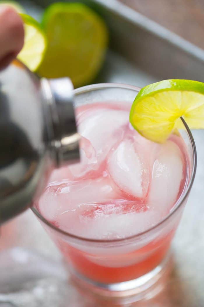 Cranberry juice and tangerine lemonade make this margarita on the beach cocktail festive and delicious!