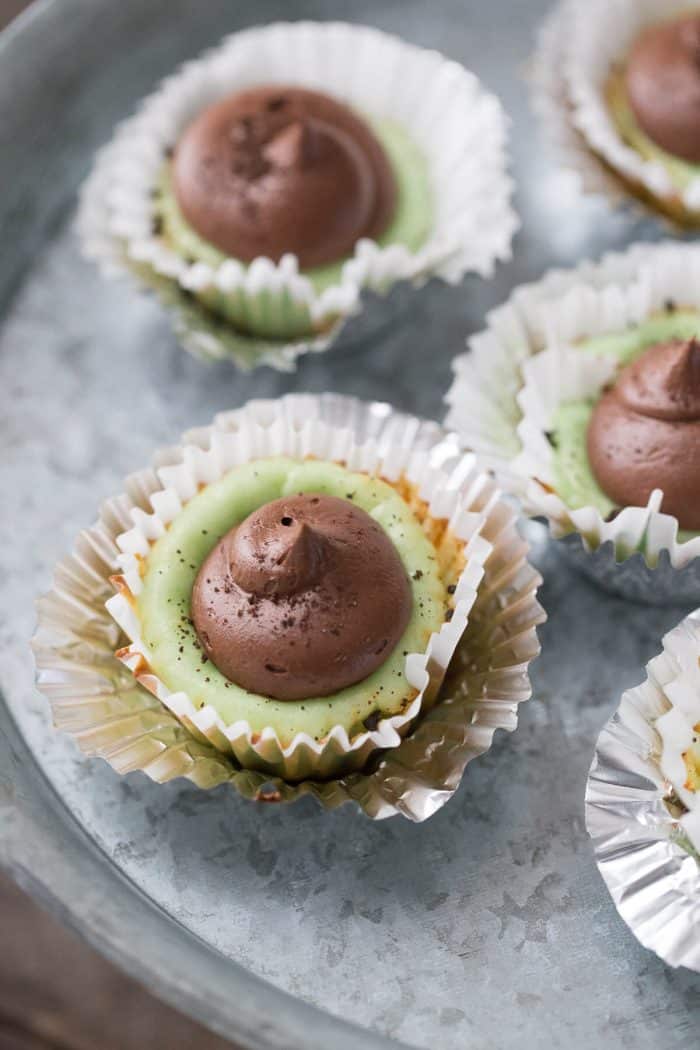 These mini cheesecakes are full of festive mint flavor! The huge frosting is the best!