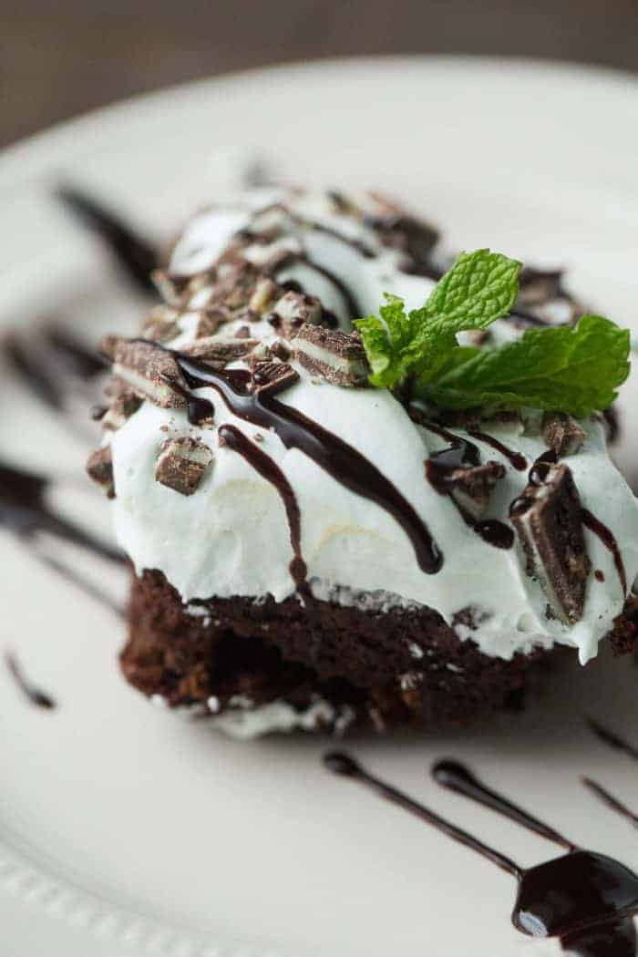 Ultra rich chocolate cake is topped with a creamy mint frosting in this easy to make mint chocolate cake