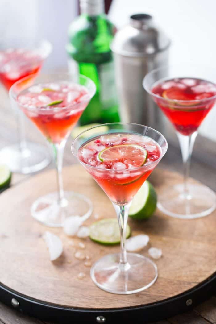A gin fizz made with tart pomegranate juice and fresh limes! This cocktail is gorgeous AND delicious!