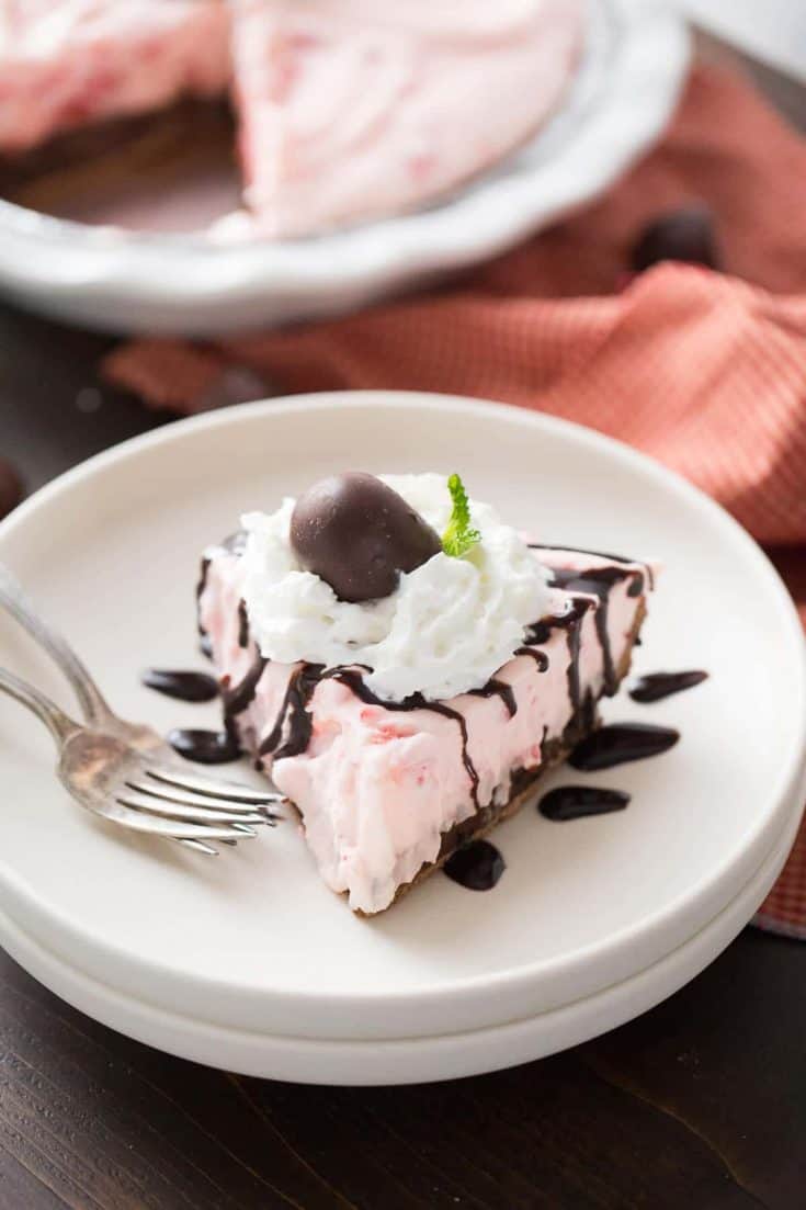 A simple cherry cream pie with a silky, chocolate bottome layer! The best cream pie ever!