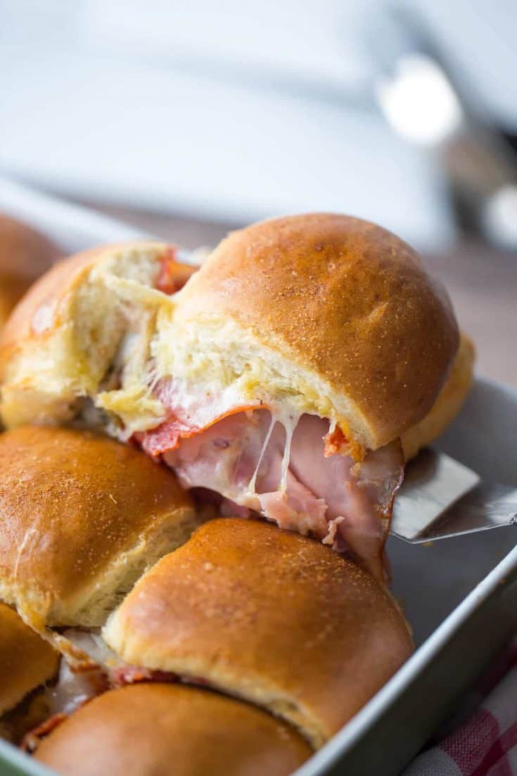 Party sandwiches at their best! These little guys have lots of Italian meats and cheese, then get baked until hot and melty!