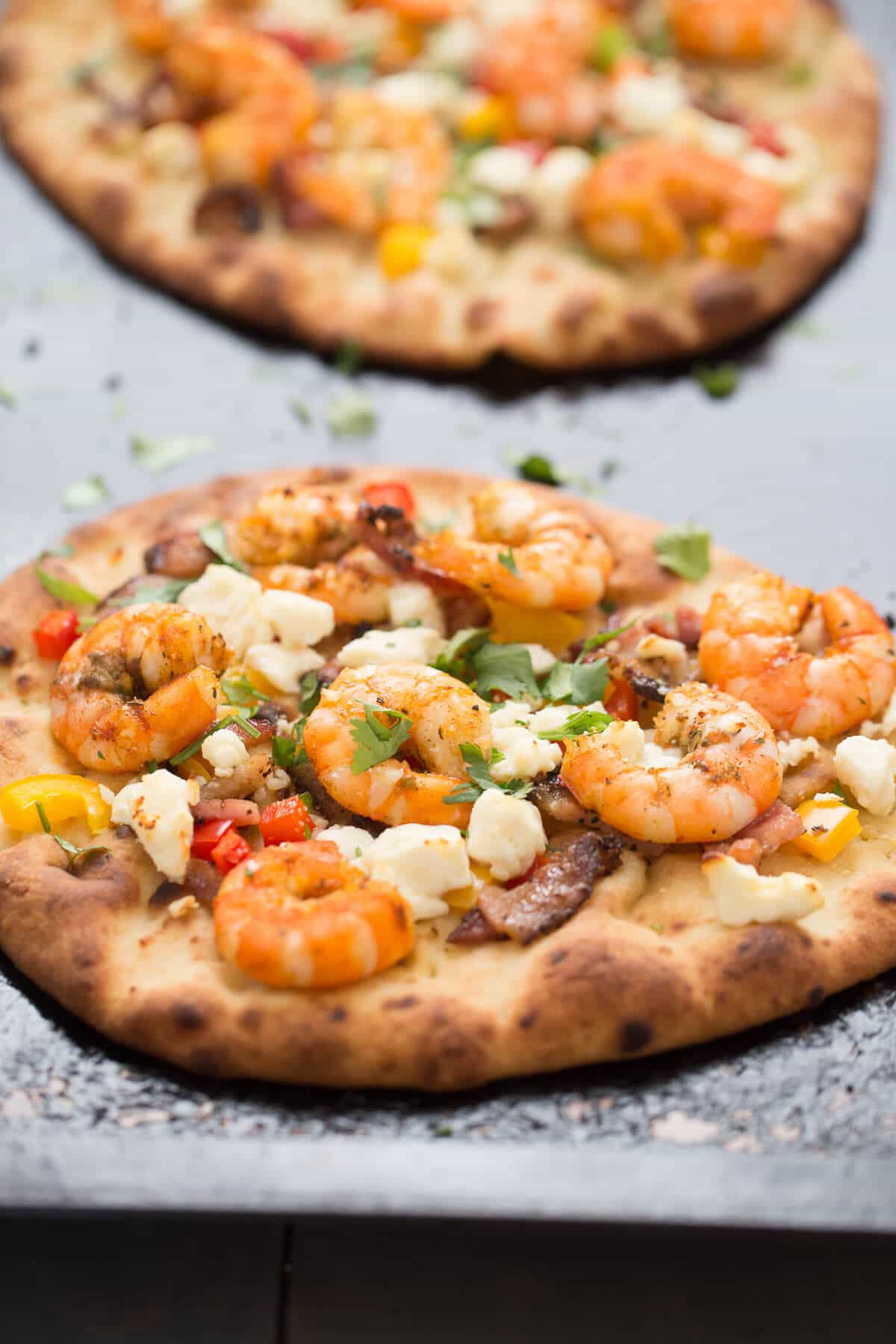 A Cajun shrimp pizza made a naan bread that takes minutes to make! Serve this as a meal or even as an appetizer!