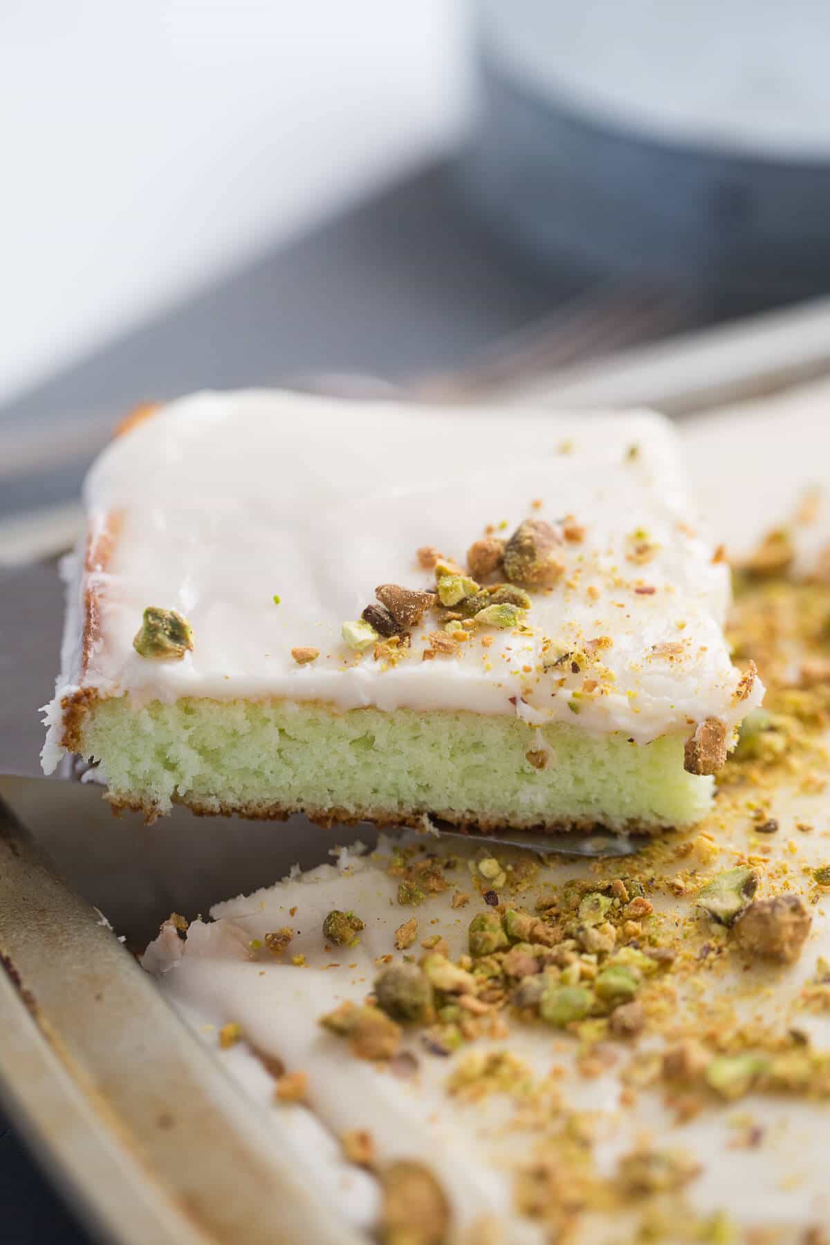 You are going to love this pistachio pudding cake. The simple vanilla frosting is the perfect compliment!
