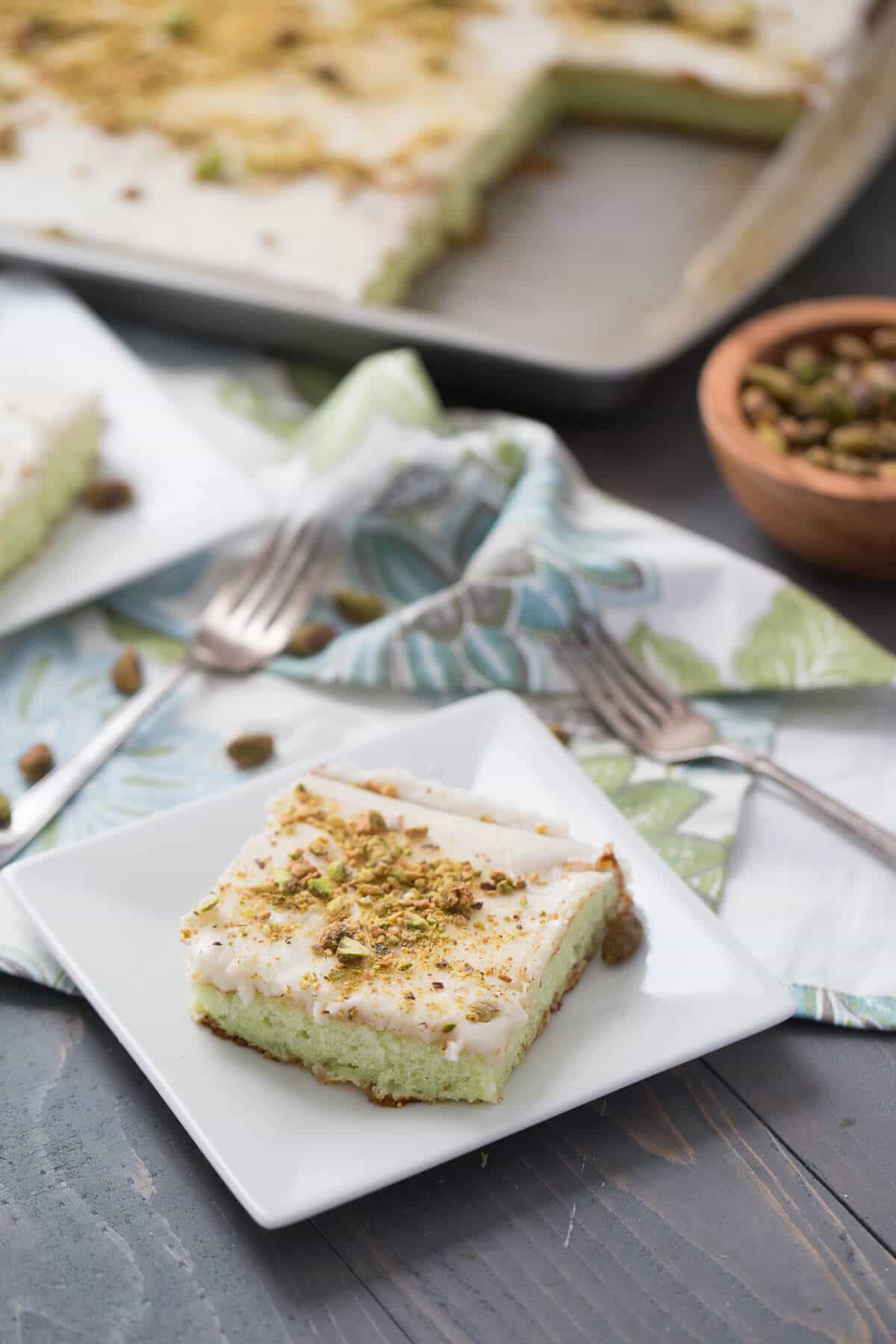 Pistachio pudding cake can be a great ending to any meal! This cake is soft, tender and sweet!