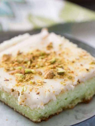 This pistachio pudding cake is simple and amazing! This cake just melts right in your mouth!