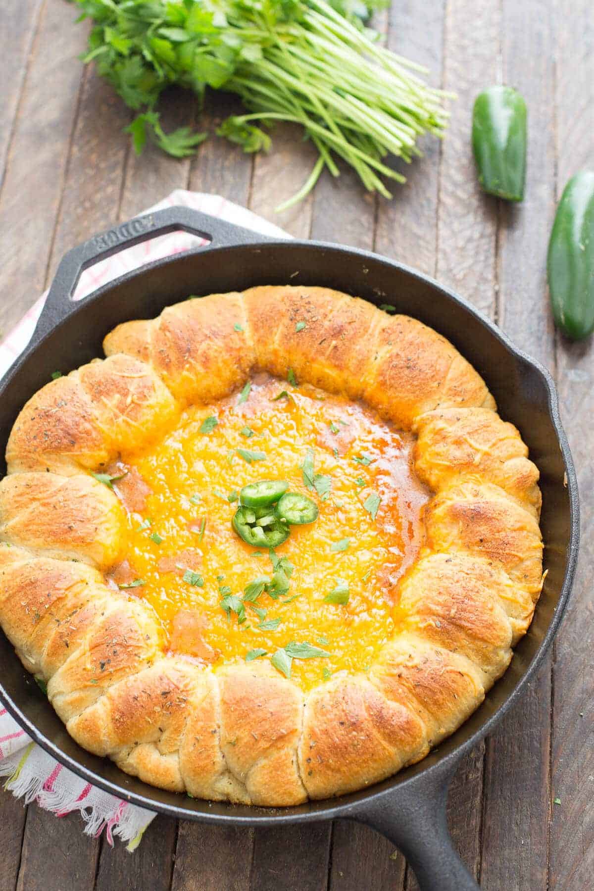 This chili cheese dip is like no other! The ring of crescent roll make it the best!