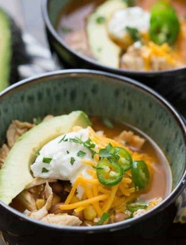 This slow cooker chicken chili is so easy! Let the slow cooker do all the work! This is a family pleasing recipe!