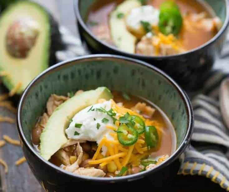 This slow cooker chicken chili is so easy! Let the slow cooker do all the work! This is a family pleasing recipe!
