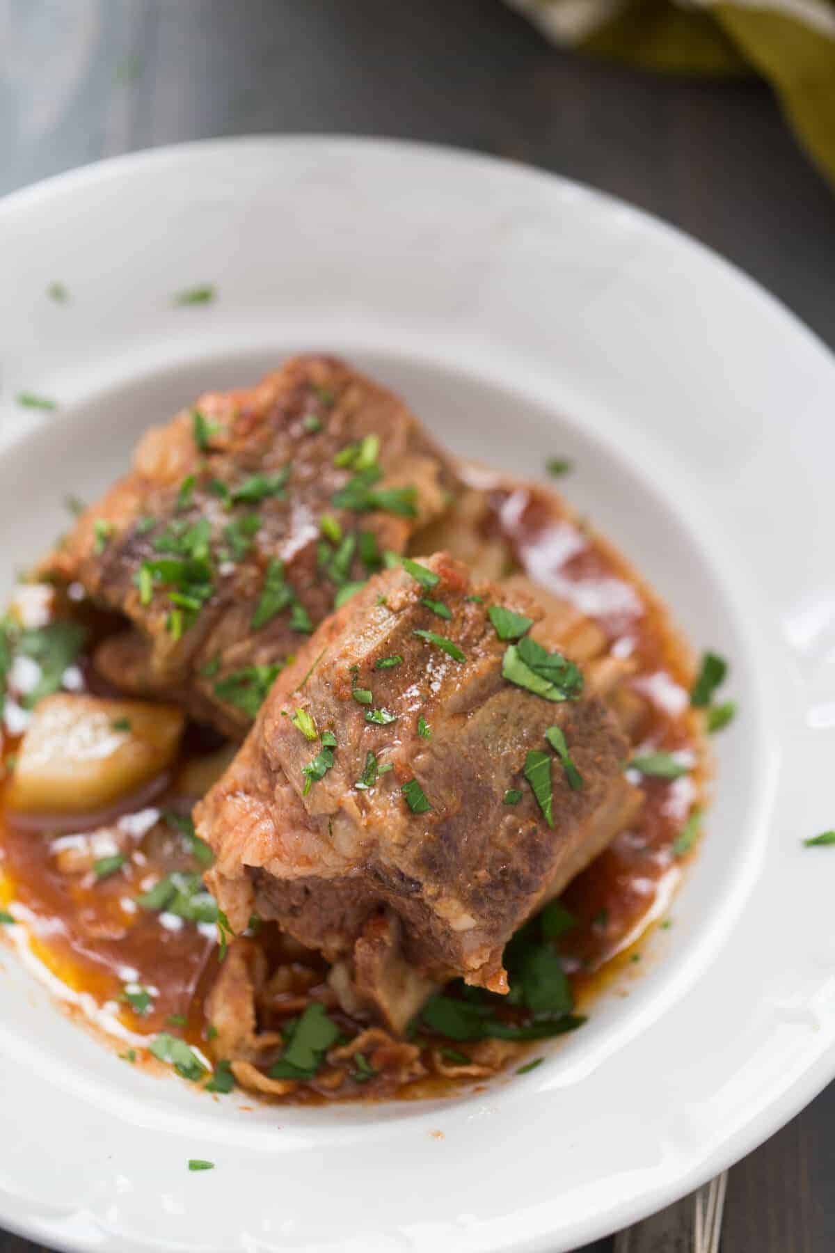 Guinness makes these slow cooker short ribs taste amazing!  You will love this hearty meal!