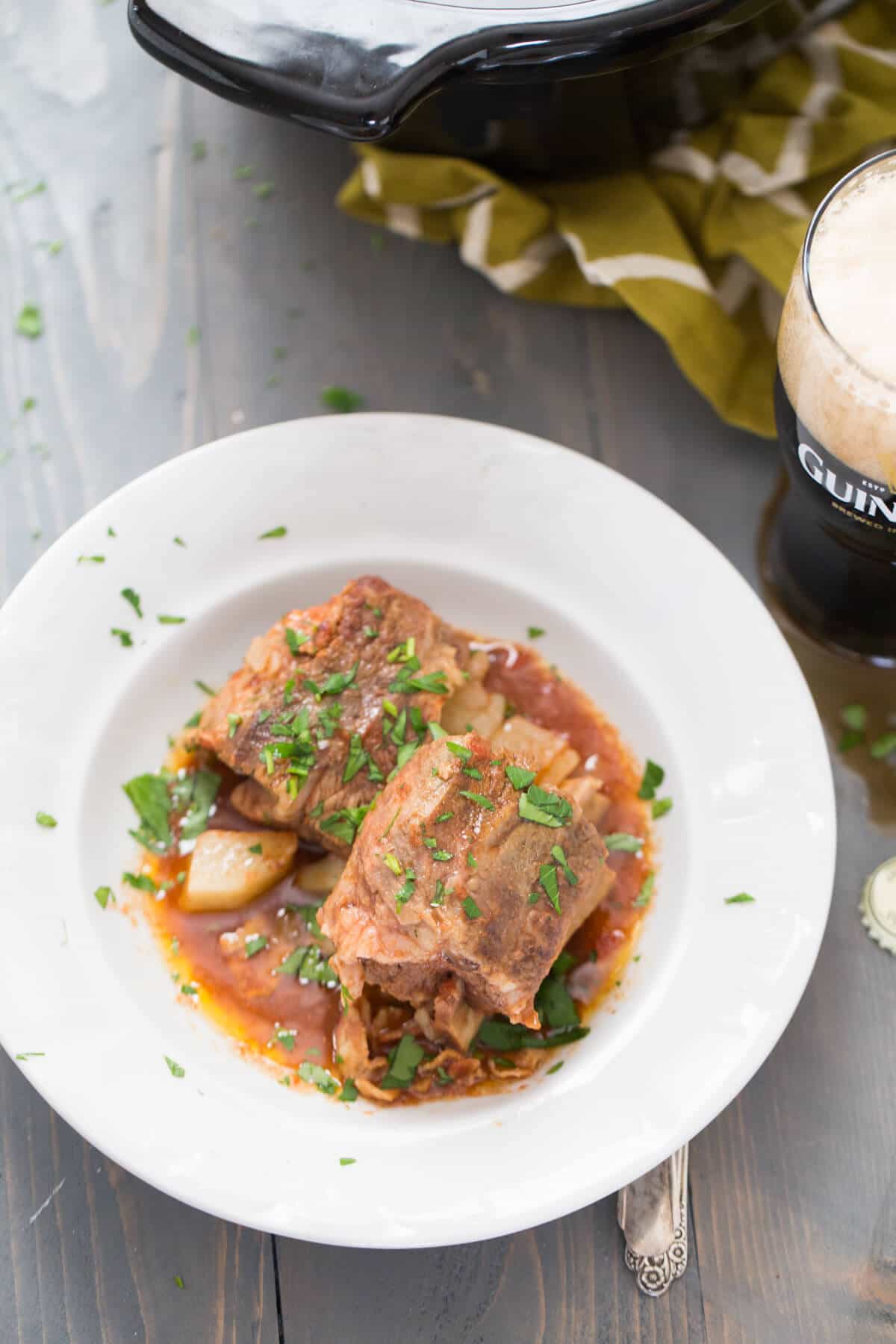 Slow cooker short ribs flavored with Guinness Stout is a satisfying mea.  You are going to love these fork-tender ribs!
