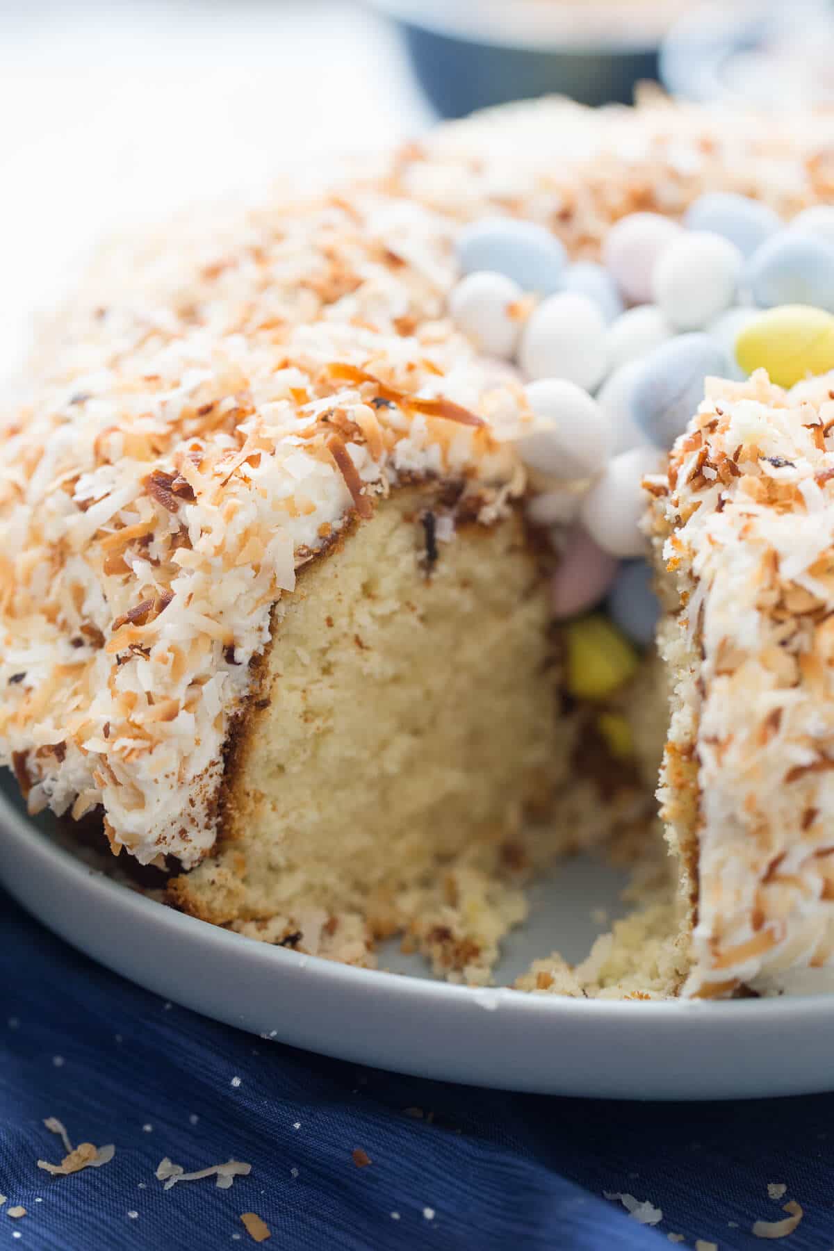 This is one impressive Easter lemon bundt cake! Toasted coconut is arranged with chocolate eggs to look just like a birds nest!