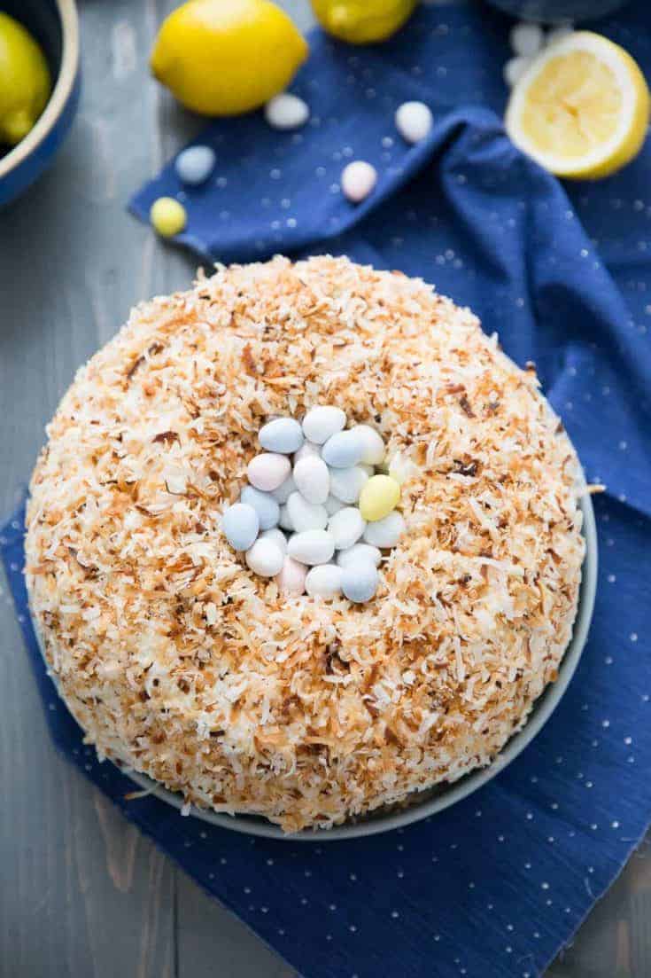 This Easter cake looks so fancy but it is rather easy to prepare! A subtle lemon bundt cake is the base while toasted coconut top it off!