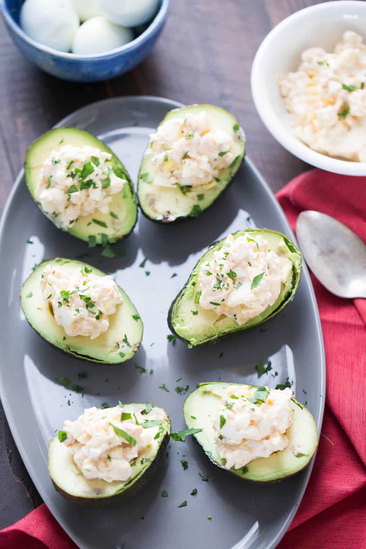 Deviled egg avocados will be taking the place of deviled eggs! This is a whole new way to enjoy avocados!