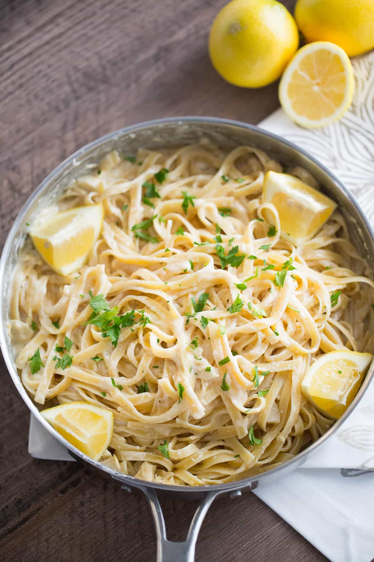 You are going to love this easy Fettuccine Alfredo recipe! The sauce is light, creamy with a hint of lemon zest!