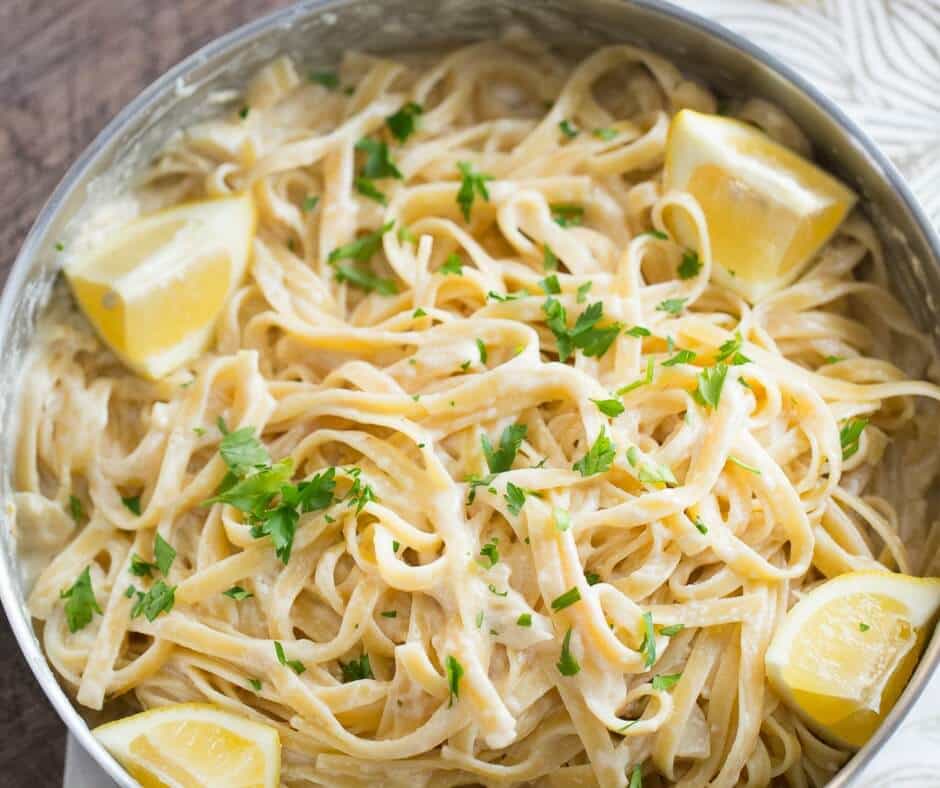 An easy fettuccine Alfredo recipe that tastes light and delicate! The lemon flavored sauce really shines!