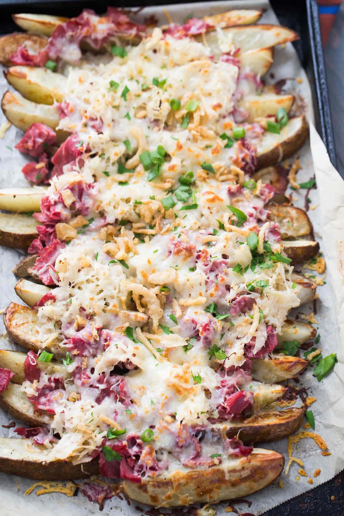 Loaded potatoes recipe-reuben style! You are going to love the toppings on this simple recipe!