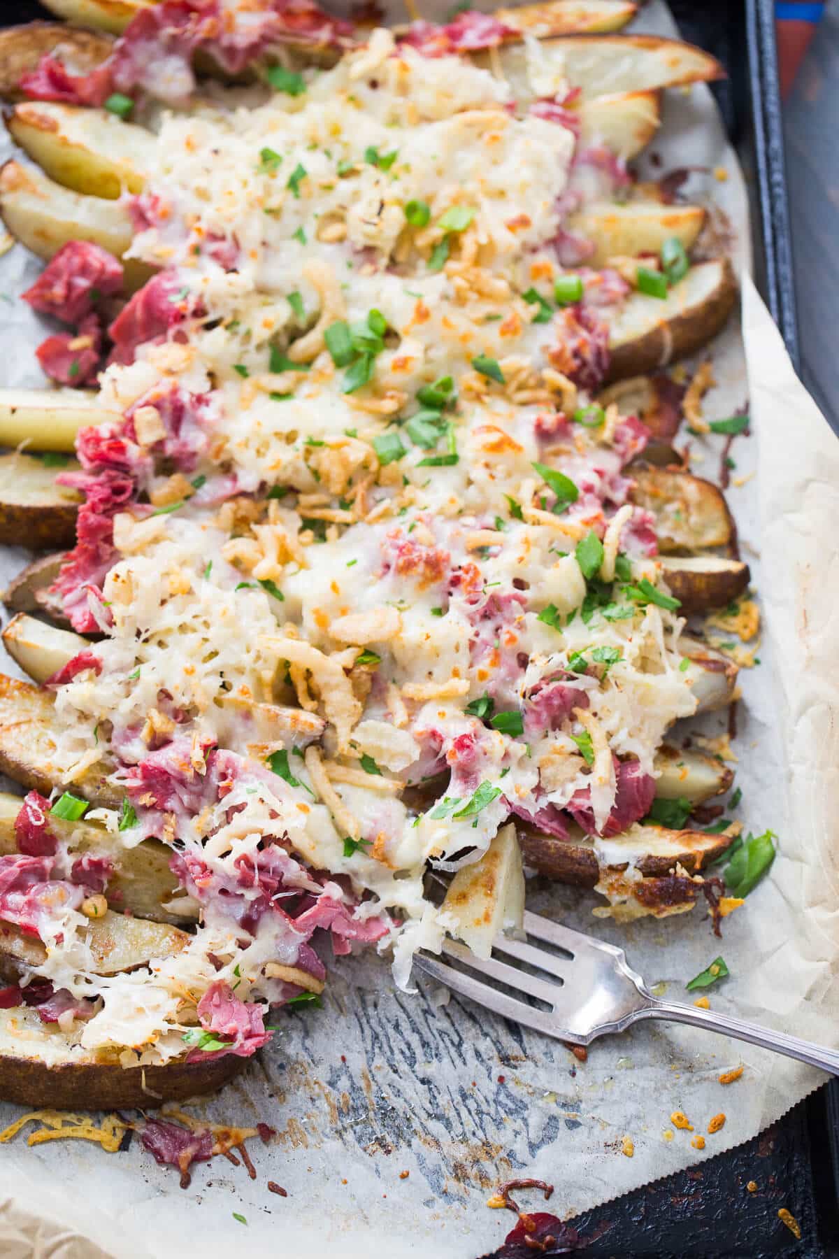 This loaded potatoes recipe is topped with classic reuben toppings! You will love these!