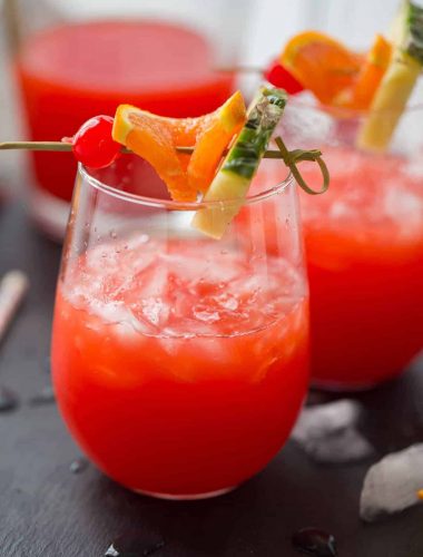 This rum punch recipe is going to be your drink this summer! It is so good!