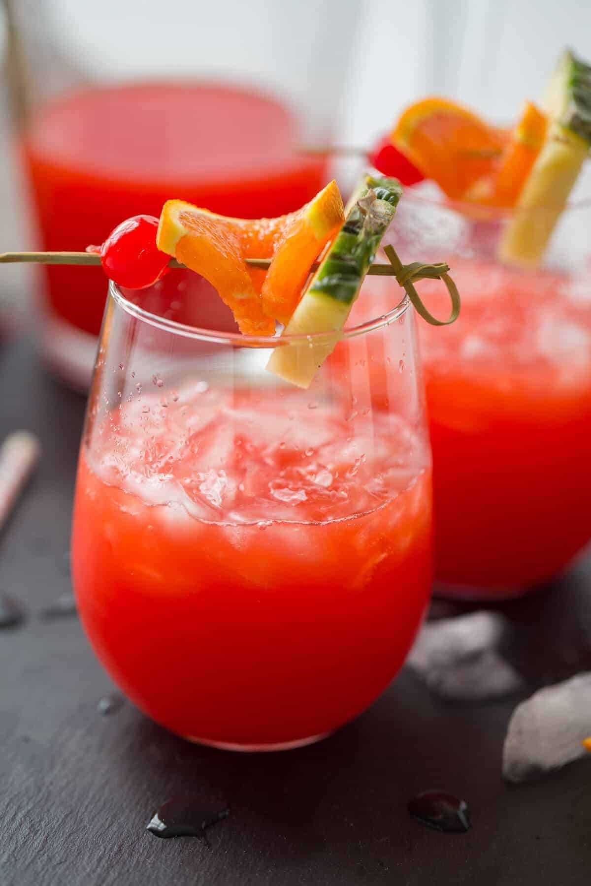  This rum punch recipe is going to be your drink this summer! It is so good!