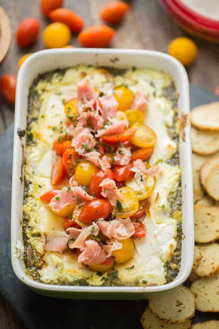 This baked goat cheese dip has three layers of goodness! The only downfall is once you start, you won't be able to stop!