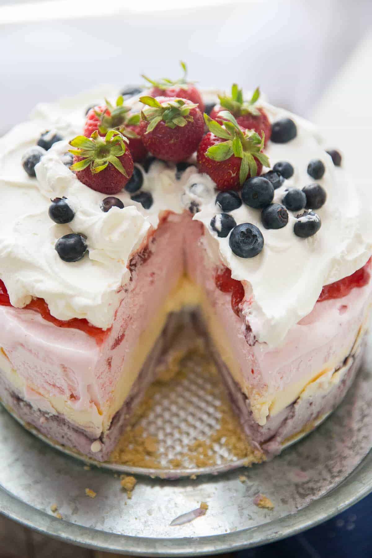 This Red, White, and Blue Ice Cream Cake is the best way to kick off the summer! This cake is so easy, yet looks so impressive!