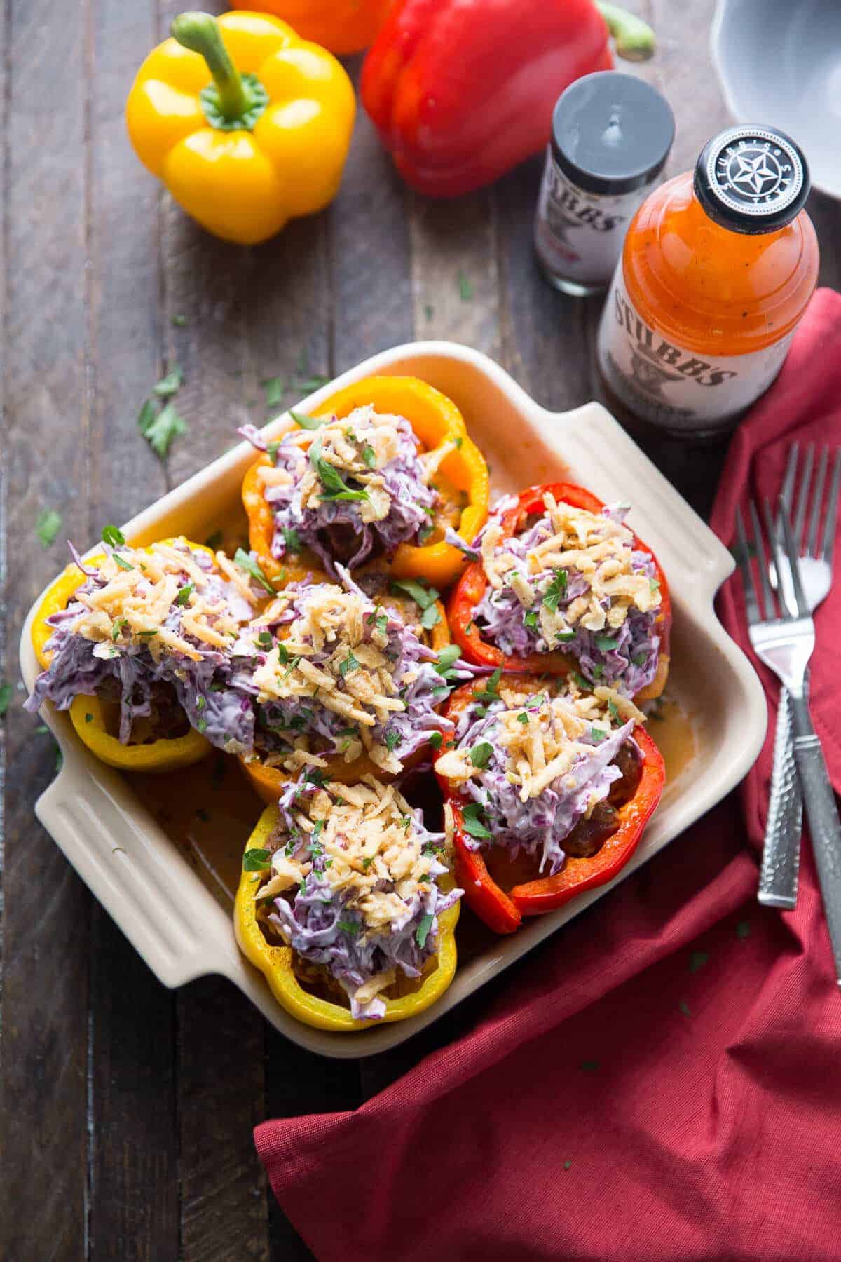 Southwest Stuffed Peppers are filled with brisket and topped with slaw!