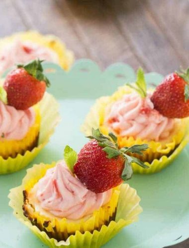 Strawberry lemonade cheesecakes will make you happy! They are sweet, tangy and totally delicious!