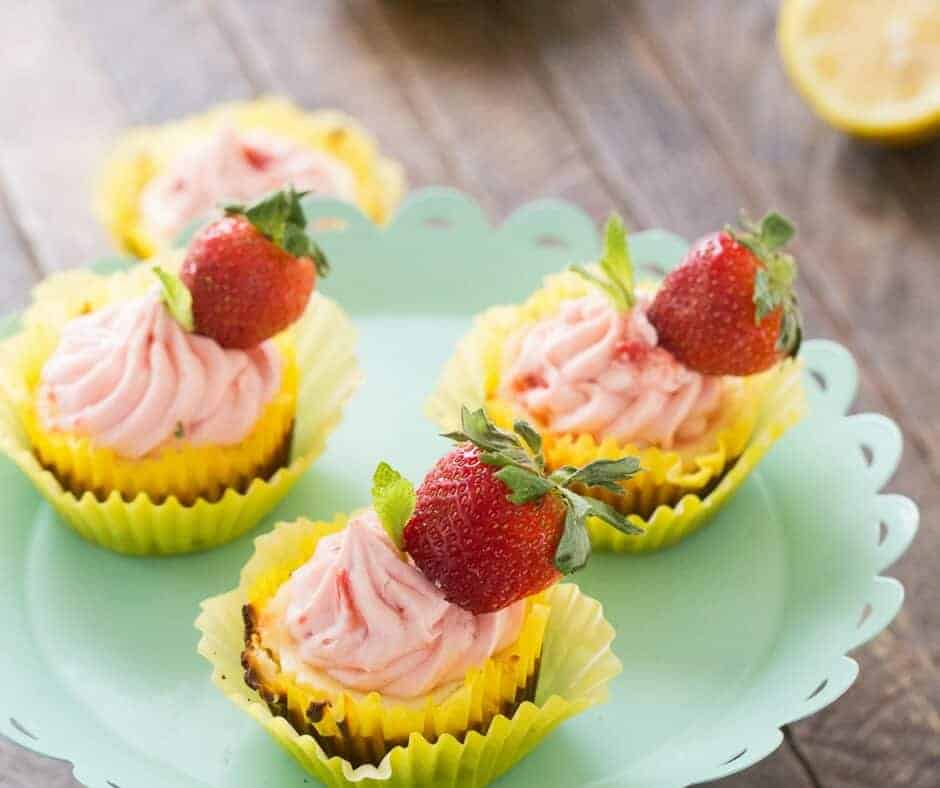 Strawberry lemonade cheesecakes will make you happy! They are sweet, tangy and totally delicious!